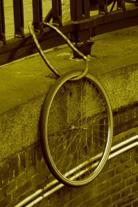 Bicycle-come-unicycle. 